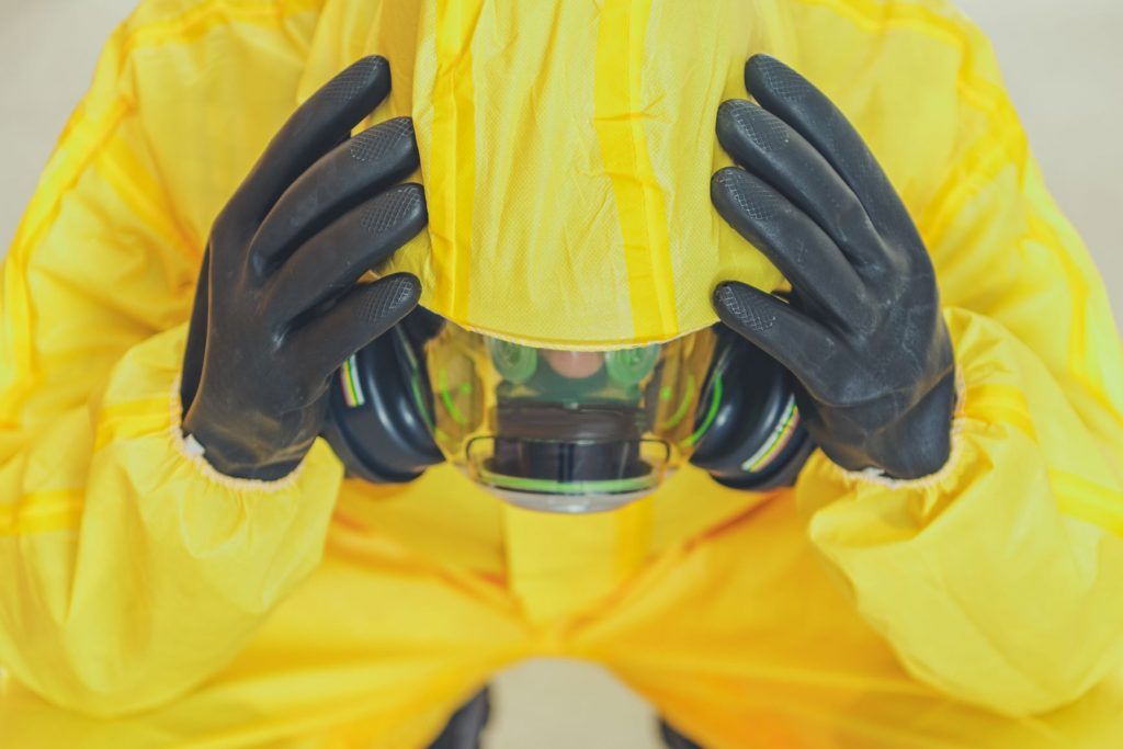 Image of man wearing an asbestos protection suit | Featured image Asbestos Related Diseases - Asbestos Illness and Asbestos Disposal Brisbane