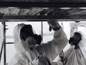Photo of workers removing asbestos | Featured image for the blog Asbestos Removal Methods from Asbestos Removals Methods.